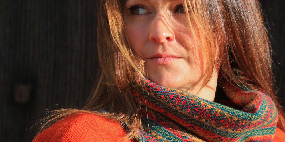 Wholesale cashmere blend short tunic top in burnt orange and cashmere blend geo snood in red and grey, machine-washable Italian knitwear by Cadenza Italy
