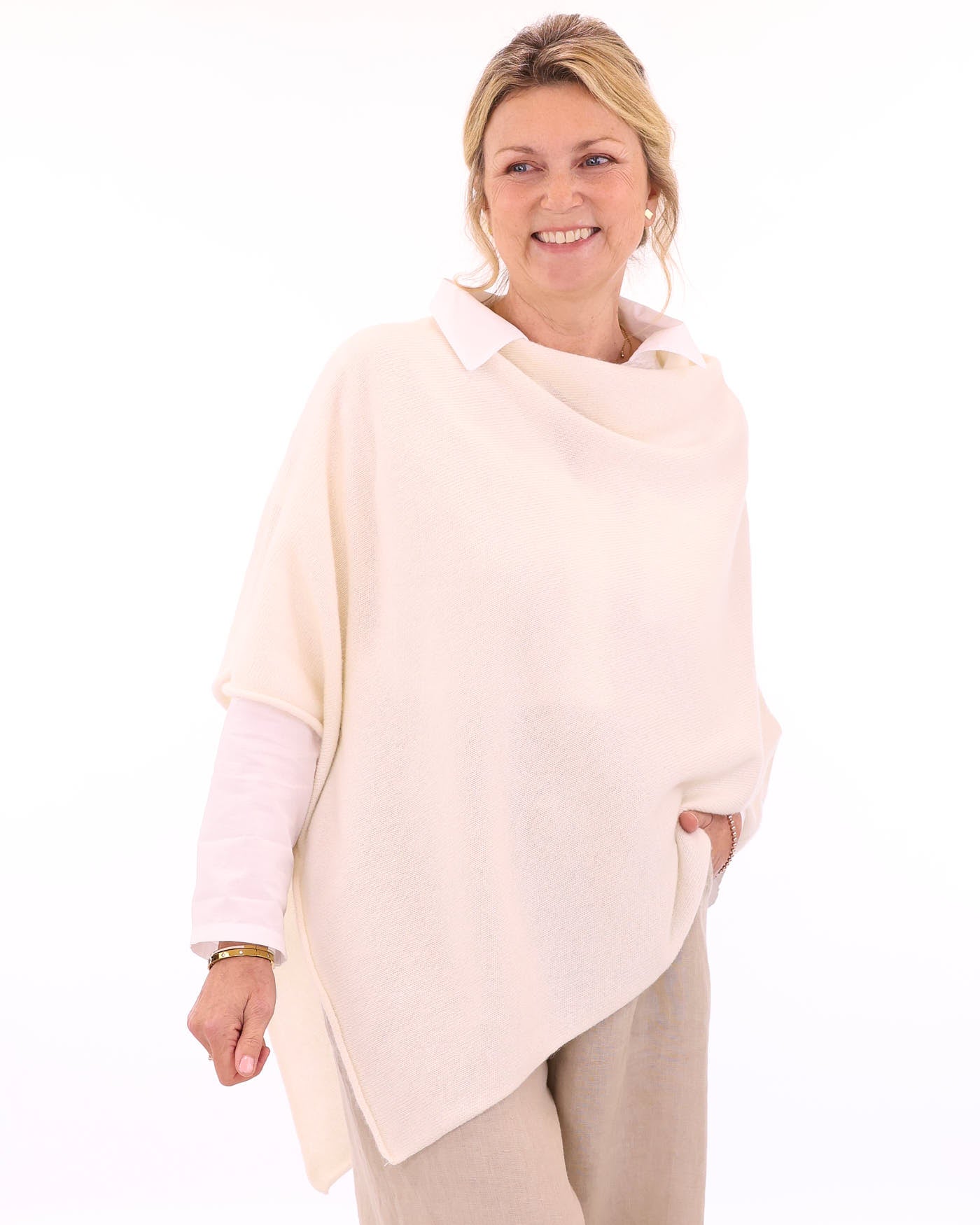 Women's cashmere blend poncho in ivory white, made in Italy