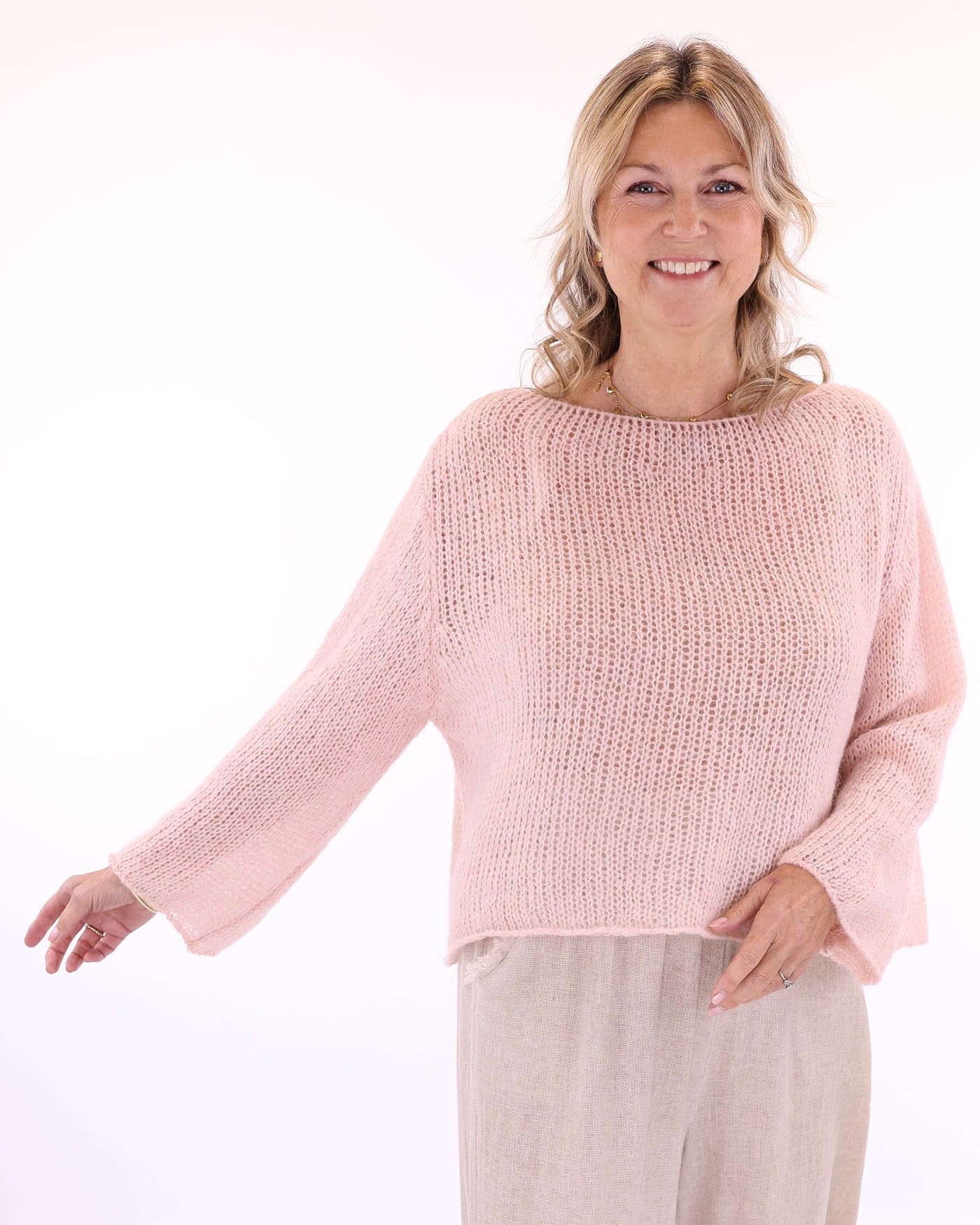 Women's long sleeve cobweb alpaca blend knitted sweater in pale pink, made in Italy