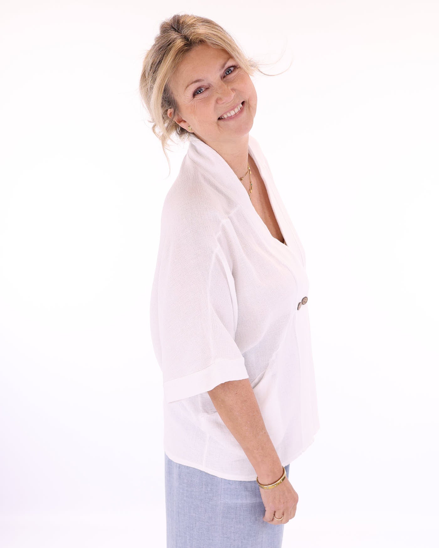 Women's Italian Kimono style linen and cotton blend jacket in white, with coconut buttons, elbow-length sleeves and front pockets